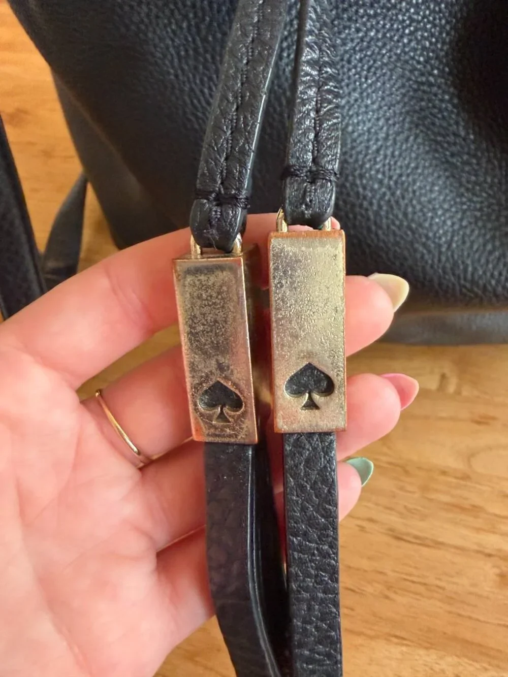 Kate Spade Pebbled Leather Backpack with tassles